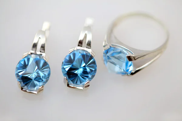 Silver jewelry with blue topaz
