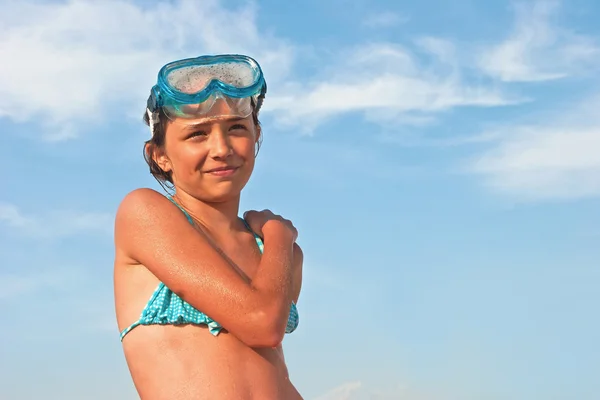 Young girl with diving goggles