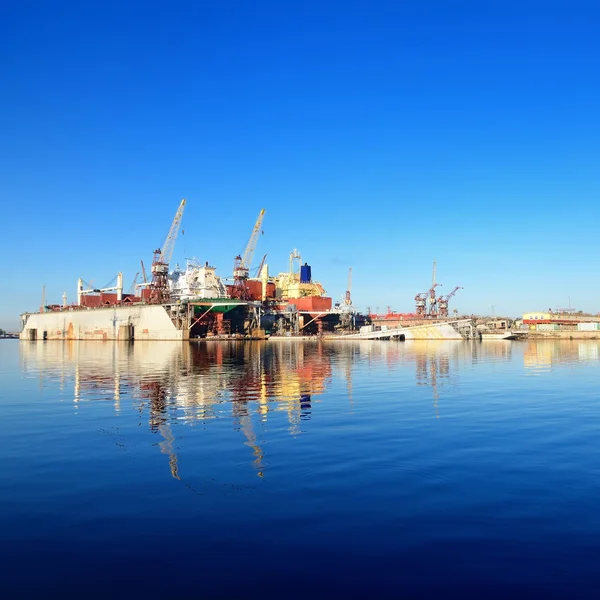 Cargo ship during fixing and painting