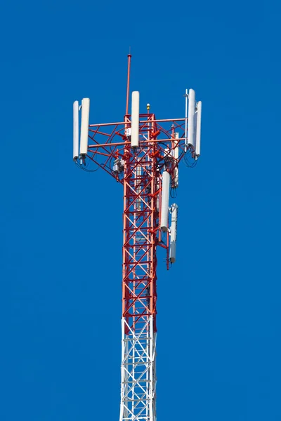 Telecommunications tower with blue sky