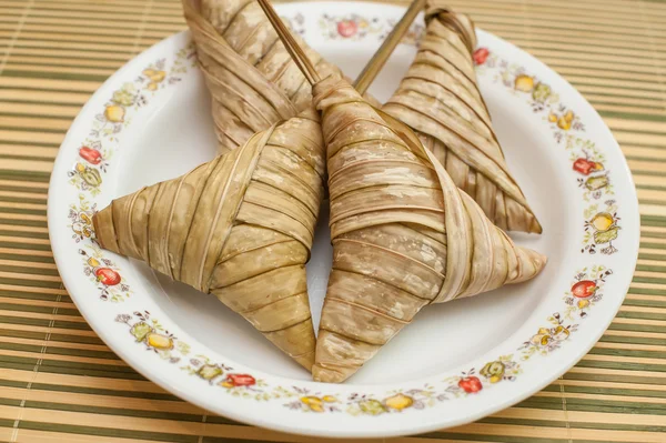 Delicious Ketupat Daun Palas ready to eat on Eid Festival