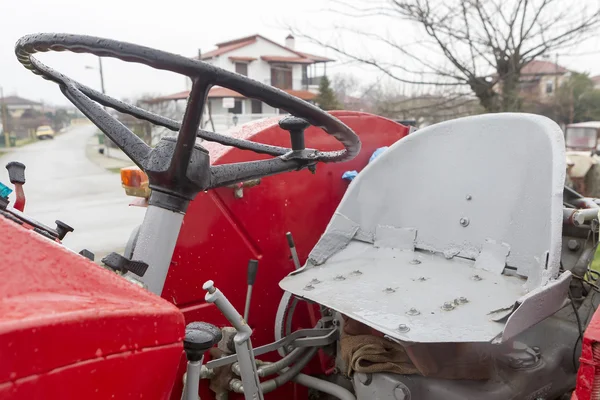 A vintage tractor steering wheel