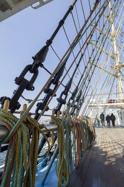 Sea hemp ropes and pulleys on the old nautical vessel