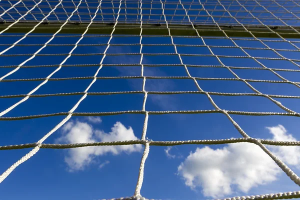 White football net, blue sky