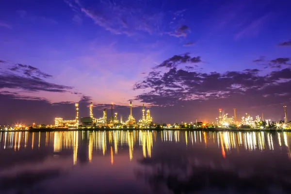 Oil refinery at twilight beside Chao Phraya river