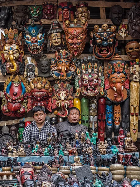 Shop Keepers Sitting at Traditional Souvenir Shop in Kathmandu, Nepal