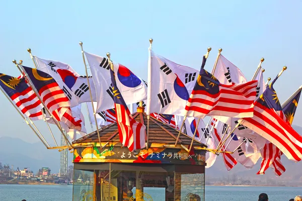 There are many flag ferry to Nami Island, Korea.