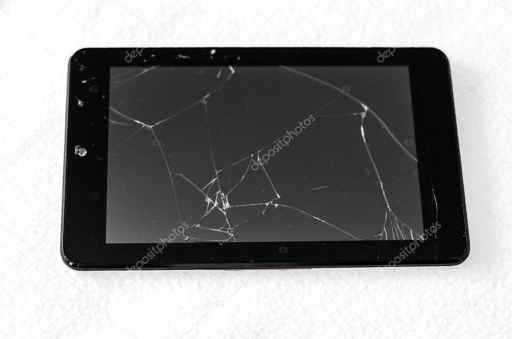Broken tablet — Stock Photo © KatarinaGondova 33350465