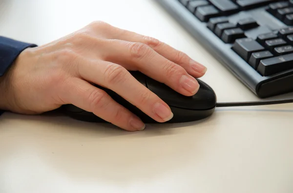 Hands on mouse and keyboard