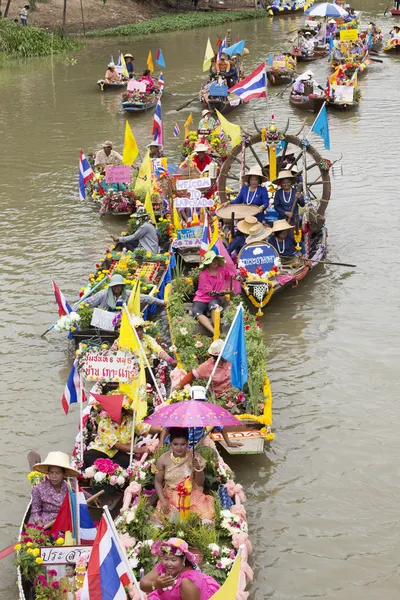 AYUTTHAYA, THAILAND - JULY 11: Unidentified people on flower boa