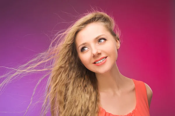 Hair in the wind. Fluttering long curls.