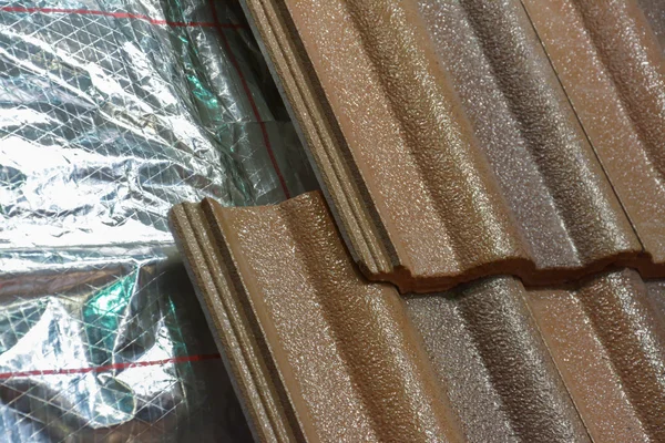Installing roof insulation in a home