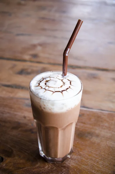 Iced chocolate on wood background