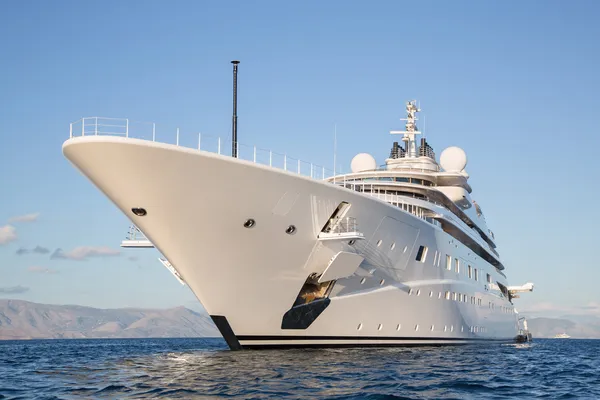 Gigantic big and large luxury mega or super motor yacht on the o