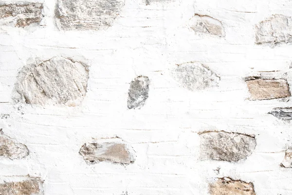 Natural wall with white and grey stones in shabby chic for a bac