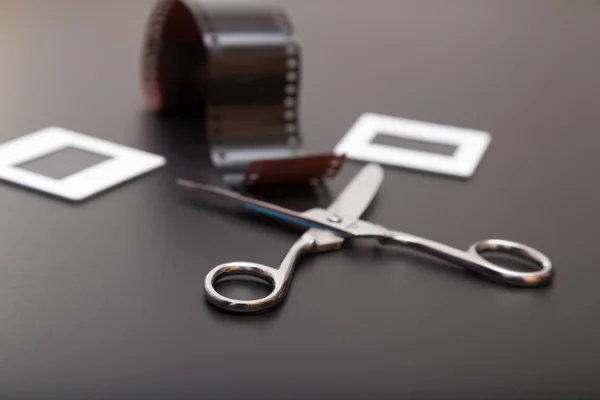 Slide , reversal film and scissors