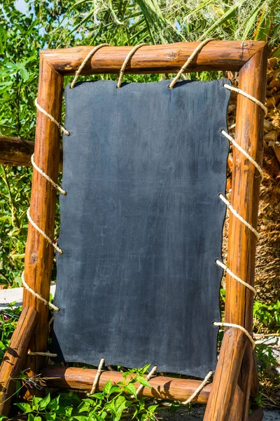 Empty black board (menu board) at a restaurant - nice backgroud