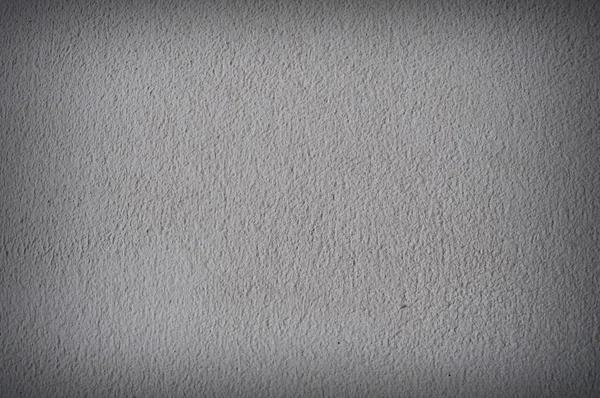 White wash wall background with vignette