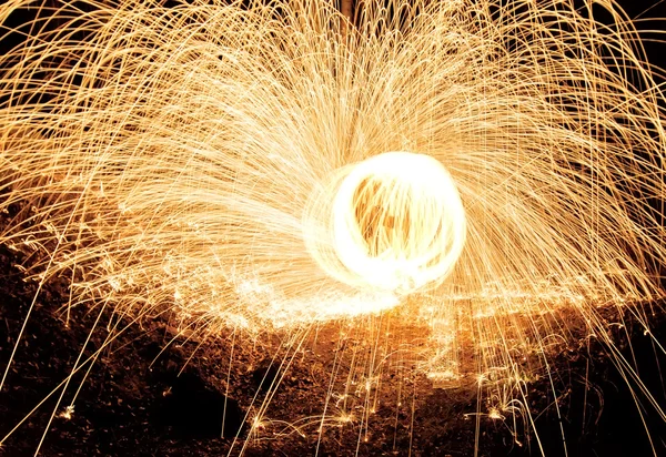 Burning ball of steel wool