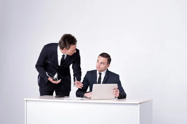 Businessmen  have conversation in office