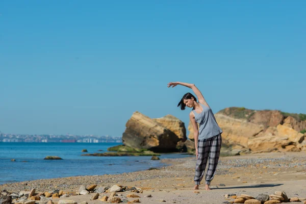 Woman has morning gymnastic