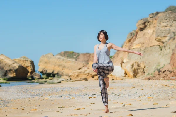 Woman has morning gymnastic