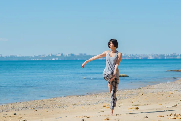 Woman has morning gymnastic