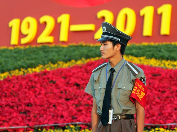BEIJING - July 3: a soldier stands guard at the entrance to the