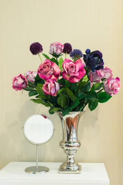 Artificial flower in vase