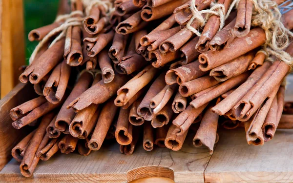 Cinnamon sticks and on wooden table