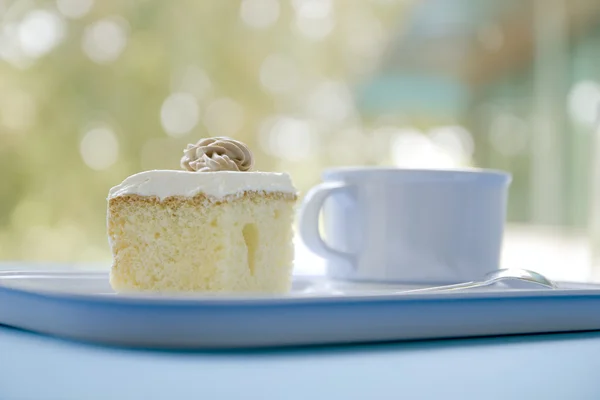 Empty coffee cups and cake pattern in buffet corner