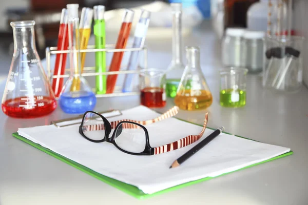 The laboratory test tubes with colorful liquid — Stock Photo #40735259