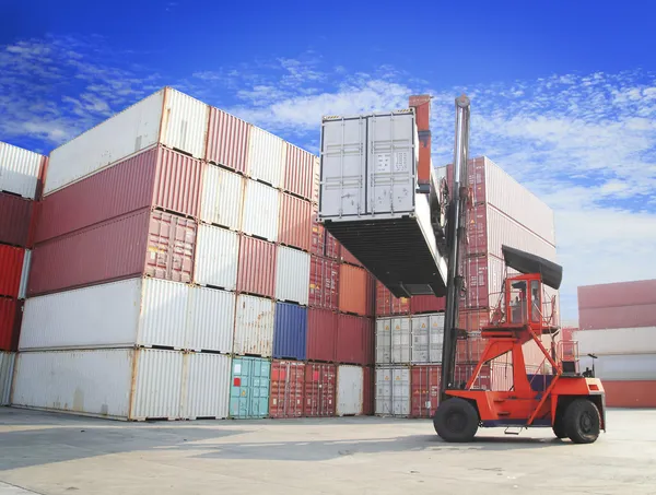 Forklift handling the container box