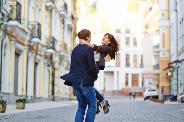 Young happy couple enjoying each other