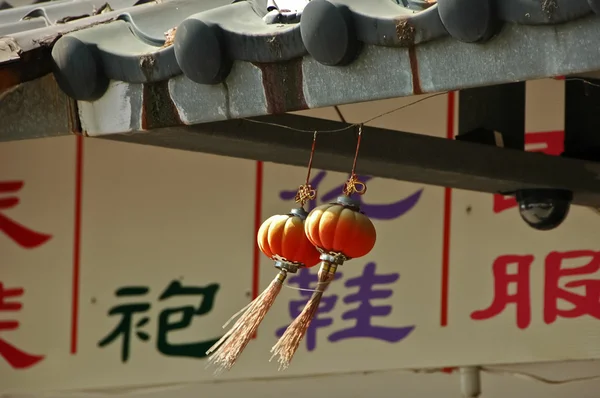 Red Chinese lanterns in windy day