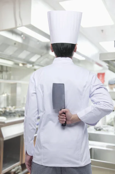 Chef with Knife Behind his Back