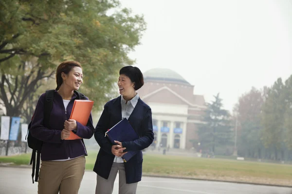 University Student and Professor on Campus