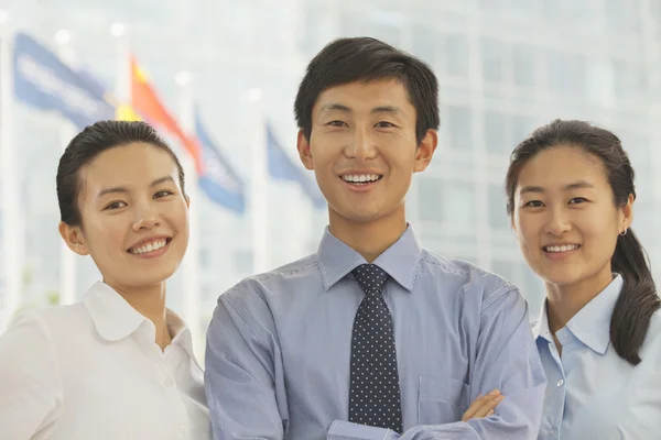 Three young business people