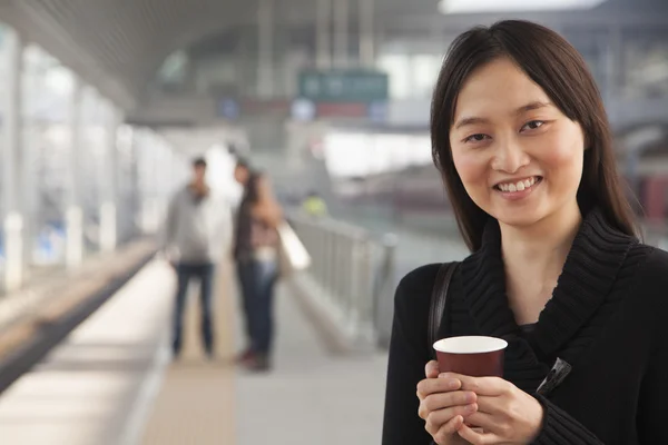 Woman on Train Platform