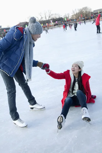 Couple at ice rink