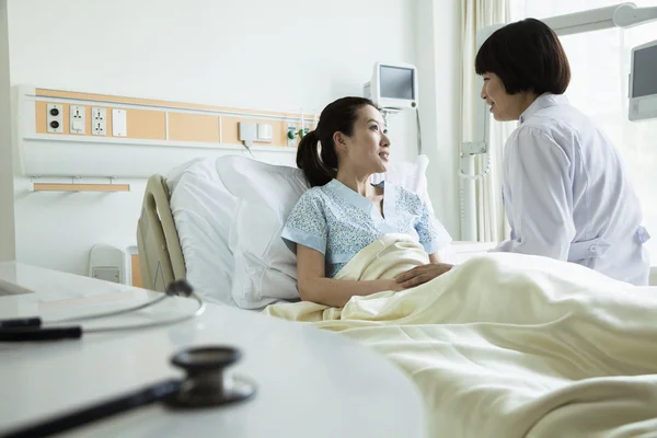 Doctor discussing with patient
