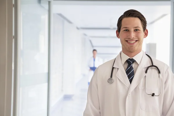 Doctor in lab coat in the hospital