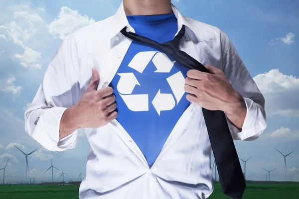 Businessman with recycling symbol underneath