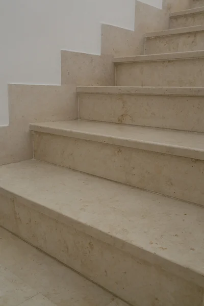 Beige marble indoor stairs