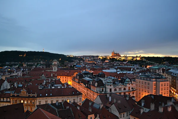 Cityscape of Old Town of Prague in dark night sky