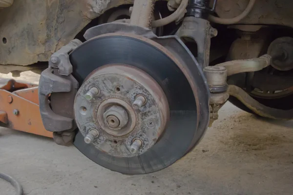 Brake disk and Used Car Break detail with tire removed