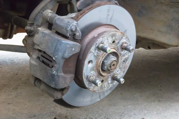 Brake disk and Used Car Break detail with tire removed