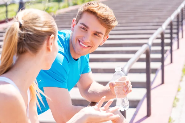 Couple in sports clothing