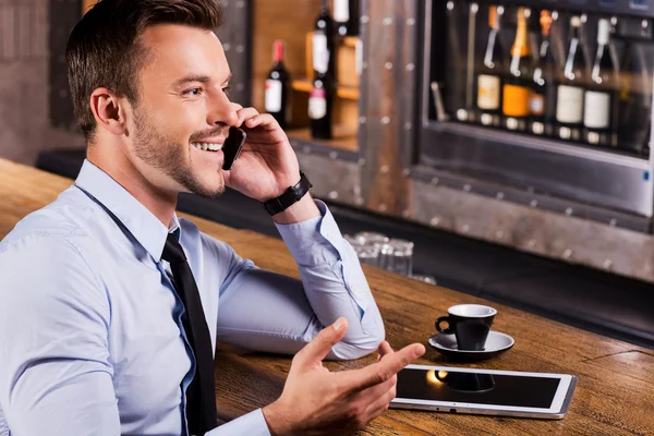 Man in shirt and tie talking on the mobile phone