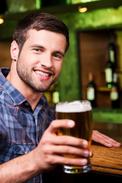 Man toasting with beer